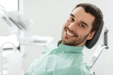 composite bonding lower plenty | man smiling in dental chair