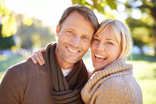 couple smiling | dental implants in lower plenty