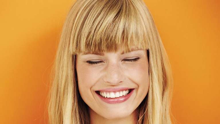 Woman smiling | Lower plenty dentist